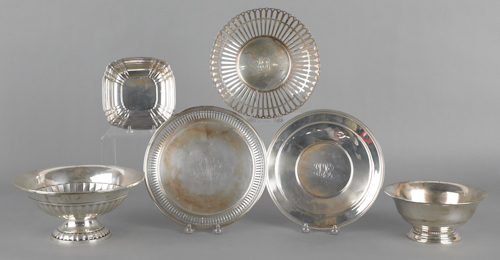 Four sterling silver bowls together