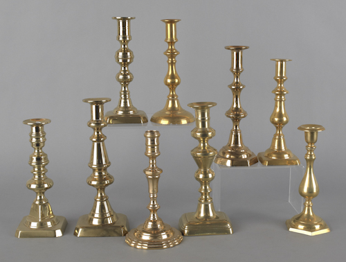 Nine assorted brass candlesticks