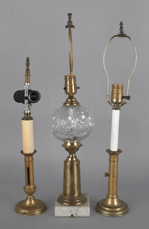 Three brass table lamps. ?