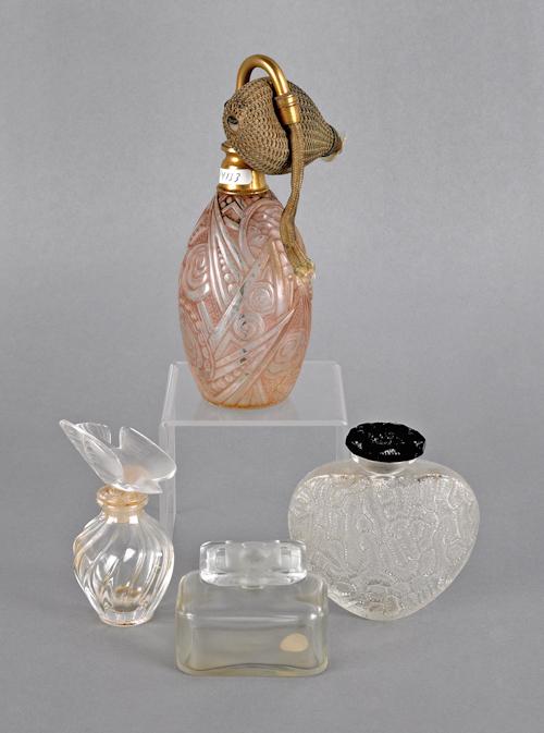 Two Lalique glass perfumes together