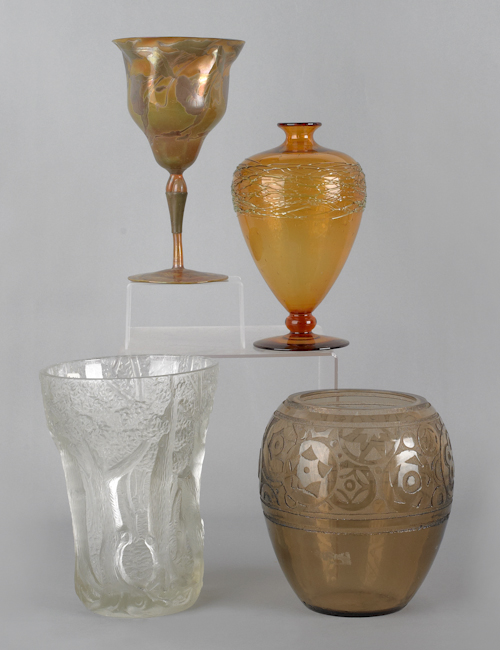 Four pieces of decorated glass