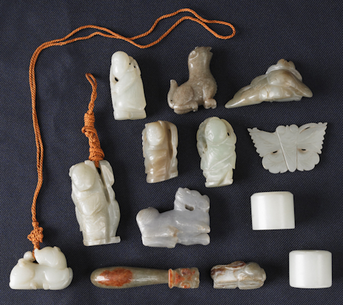 Thirteen Chinese carved jade accessories  176b2e