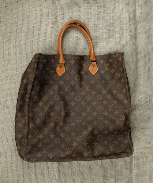 Louis Vuitton hand bag together