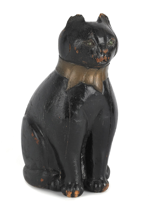 Carved folk art figure of a seated cat