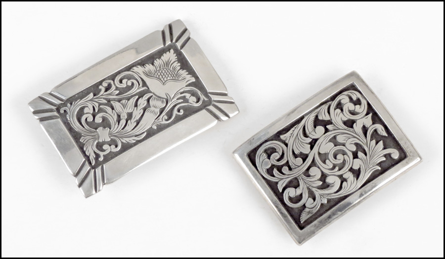 TWO STERLING SILVER BELT BUCKLES. Larger: