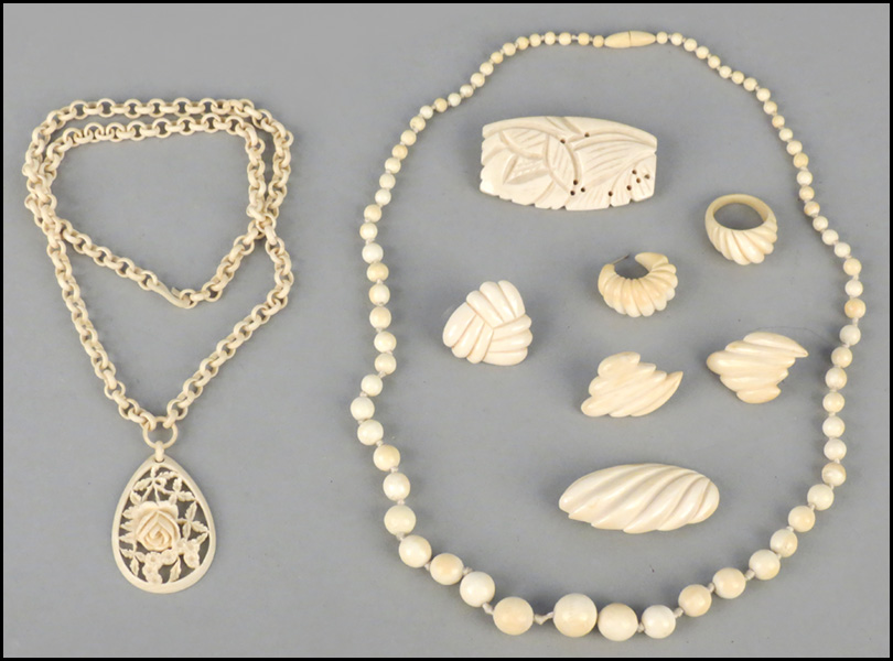GROUP OF CARVED IVORY JEWELRY.