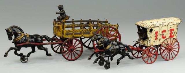 TWO HORSE DRAWN WAGONS Both cast iron