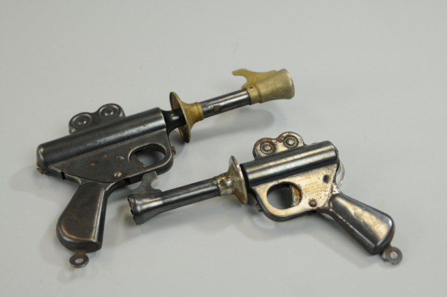 TWO BUCK ROGERS TOY SPACE PISTOLS