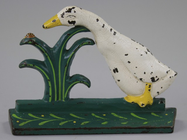 DUCK PECKING LADYBUG DOORSTOP Cast