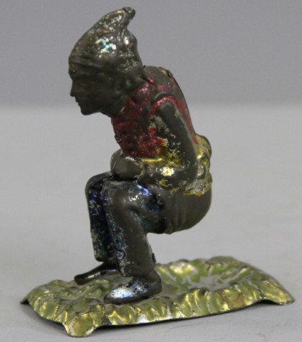 SEATED MAN PENNY TOY Germany spirit