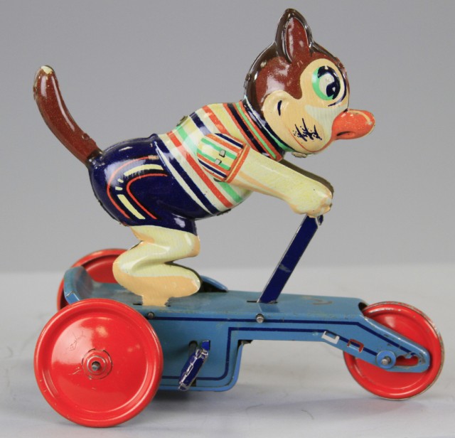 CAT RIDING SCOOTER Lithographed tin