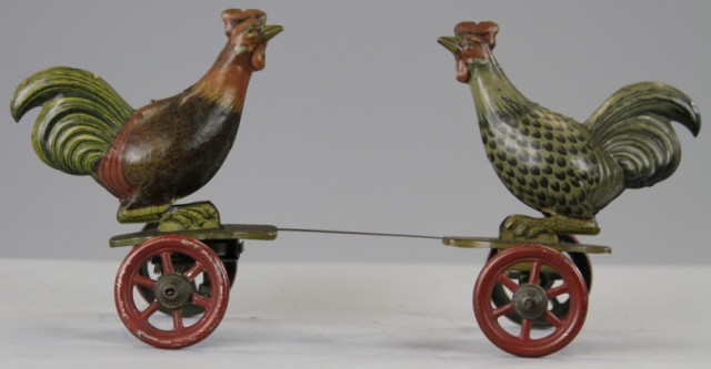 FIGHTING ROOSTERS ON PLATFORM TOY