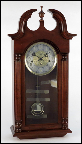 CARVED OAK SLIGH WALL CLOCK. H: 28