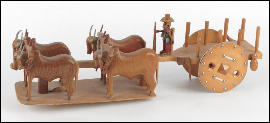 FOLK ART CARVING OXEN AND WAGON. Length: