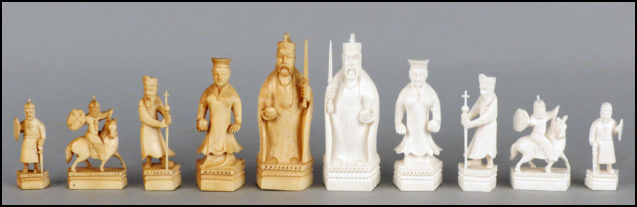 CARVED IVORY CHESS SET. Missing two