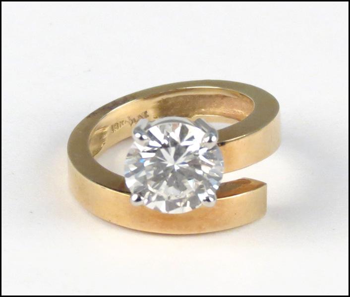 DIAMOND AND 18 KARAT YELLOW GOLD