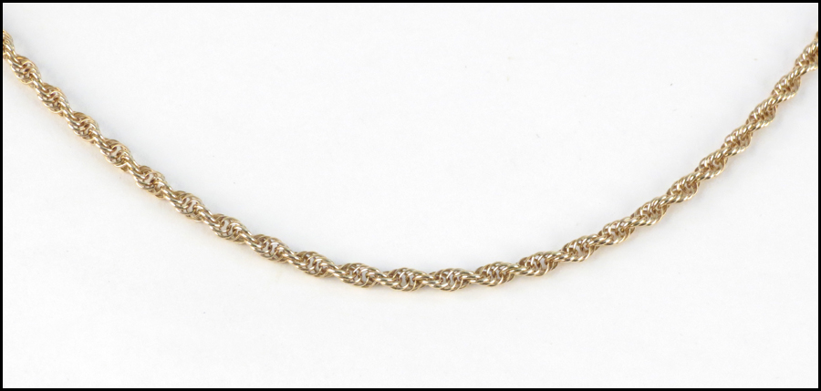 14 KARAT YELLOW GOLD ROPE NECKLACE.