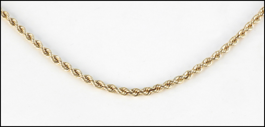 14 KARAT YELLOW GOLD ROPE NECKLACE.