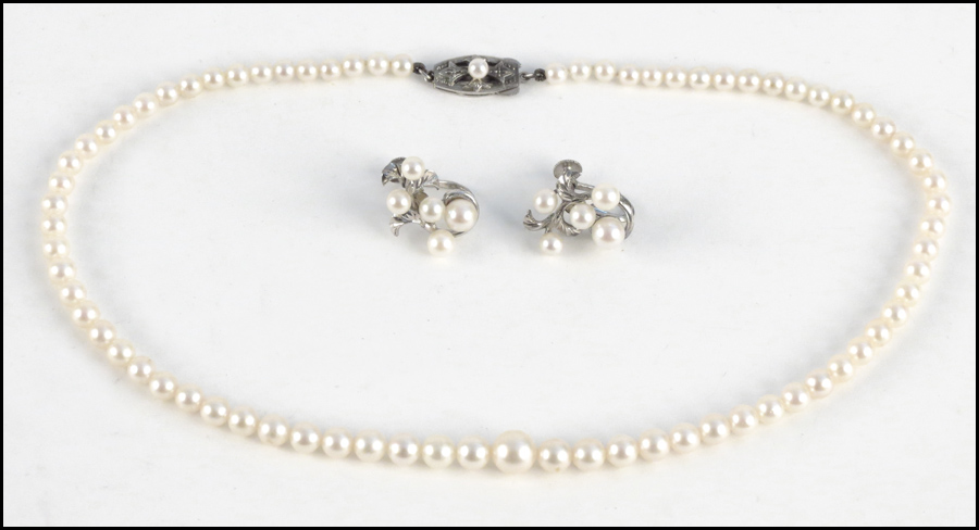 MIKIMOTO GRADUATED PEARL NECKLACE. Together