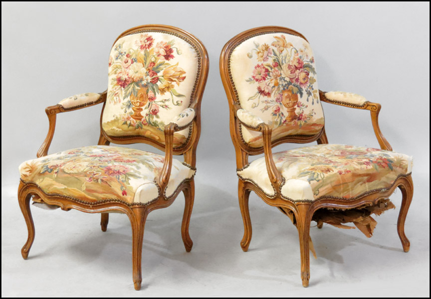 PAIR OF FRENCH CARVED WALNUT FAUTEUIL.