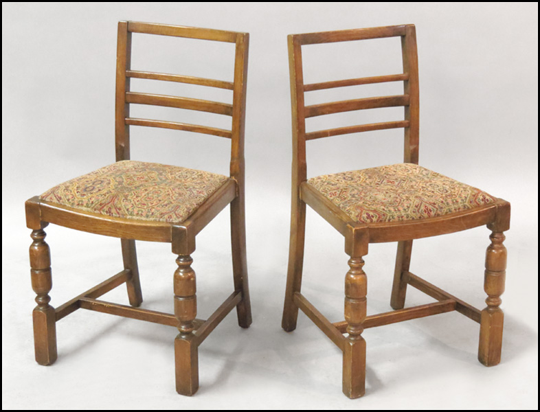 SET OF FOUR OAK SIDE CHAIRS. Back