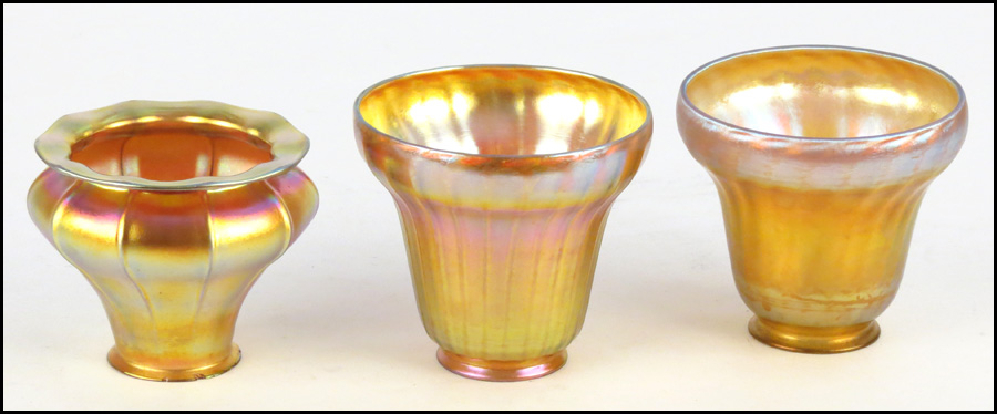 GROUP OF THREE FAVRILE GLASS SHADES.