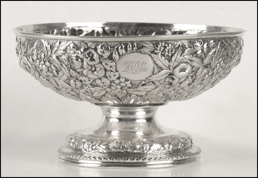 A STERLING SILVER REPOUSSE COMPOTE.