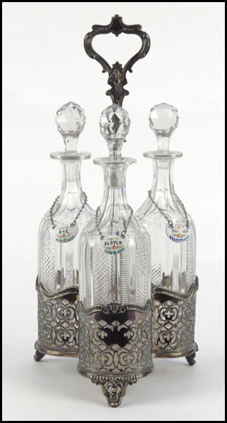 SET OF THREE CRYSTAL DECANTERS.