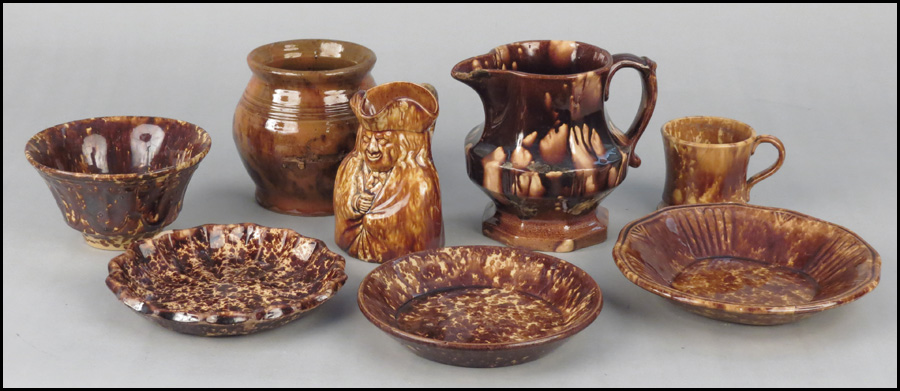 GROUP OF BENNINGTON STYLE POTTERY.