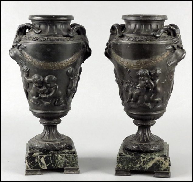 PAIR OF PATINATED METAL URNS Together 177ea6