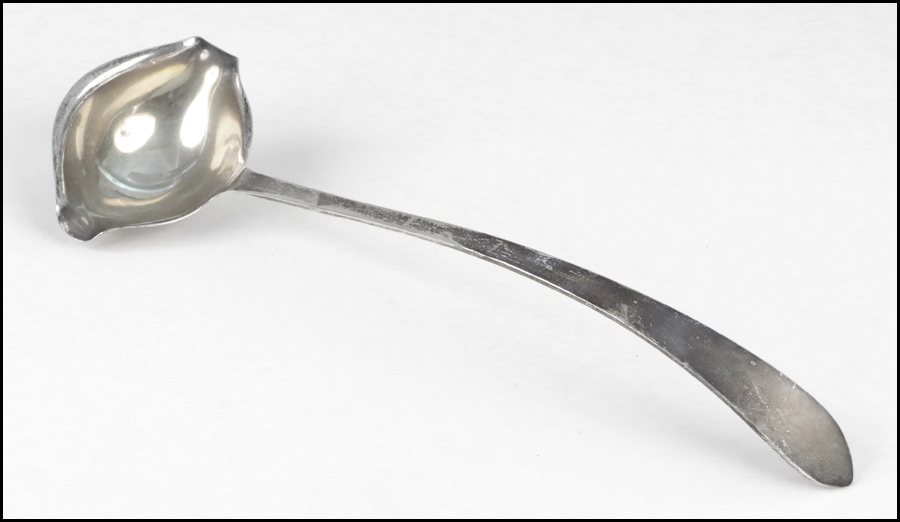 HAND WROUGHT STERLING SILVER LADLE.