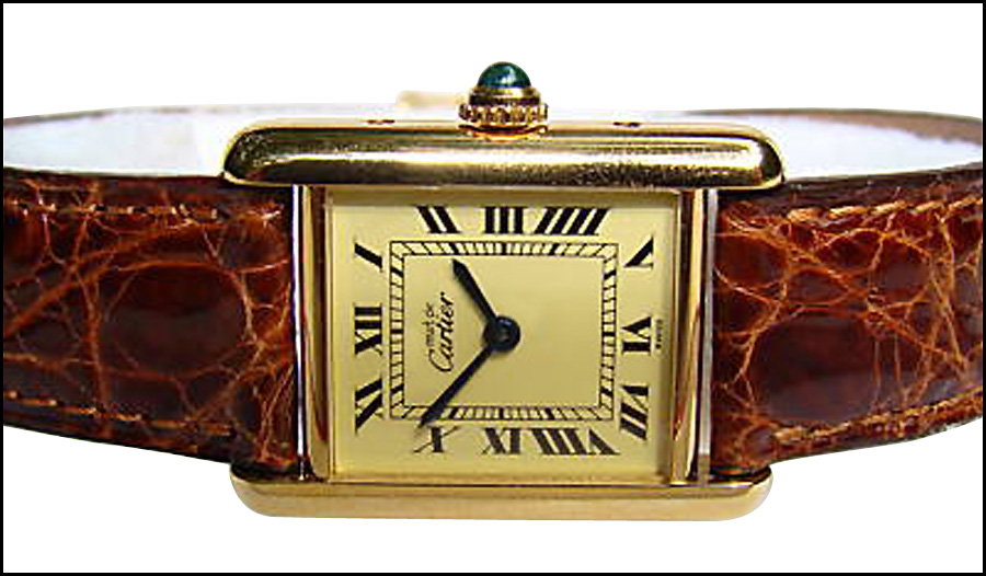 CARTIER VERMEIL TANK WATCH. Must