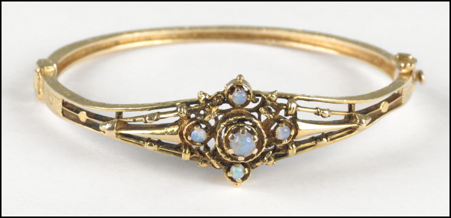 14 KARAT YELLOW GOLD AND OPAL BANGLE