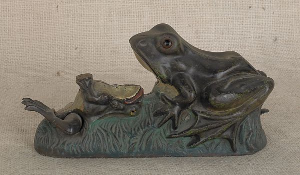 Cast iron two frogs mechanical bank.