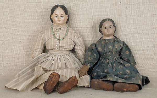 Two Greiner papier-mâché dolls.