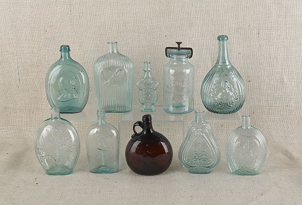 Eight aqua glass flasks together 175b87