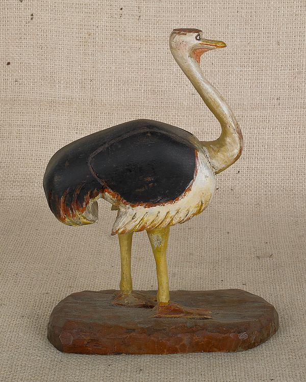 Carved and painted pine figure of an