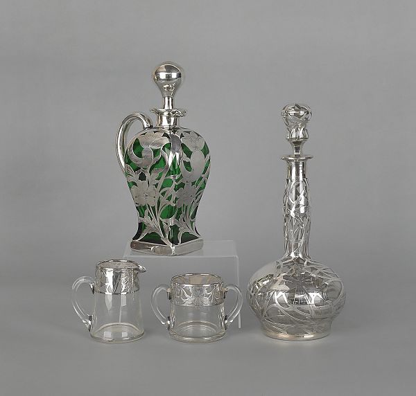 Two silver overlay decanters together