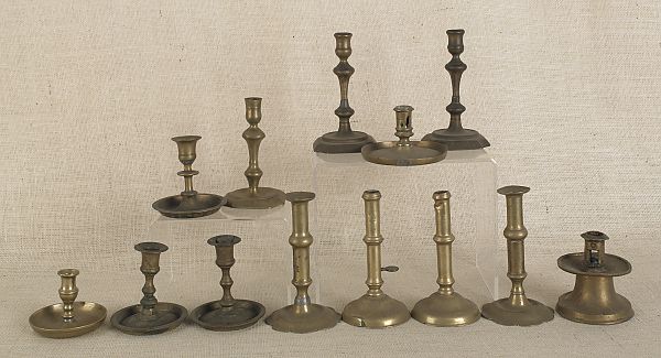 Collection of early brass candlesticks 175cb3