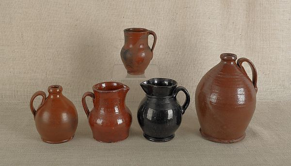 Two redware jugs 19th c together 175cf9