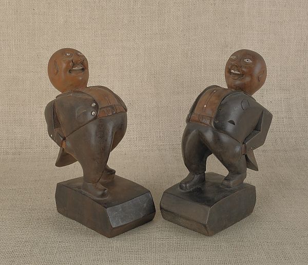 Pair of carved and painted wooden bookends