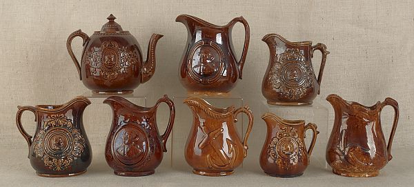 Eight pieces of pottery with Rockingham