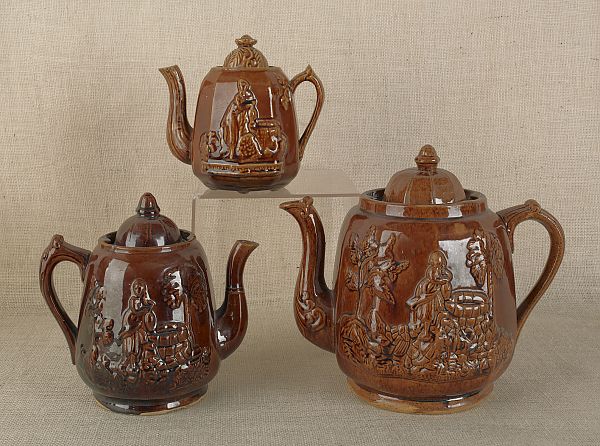 Three Rockingham glaze teapots