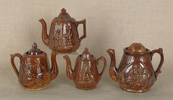 Four Rockingham glaze teapots 19th