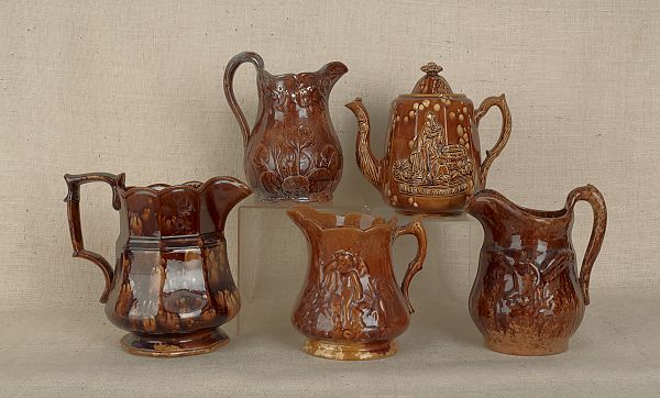 Four Rockingham glaze pitchers 175e16