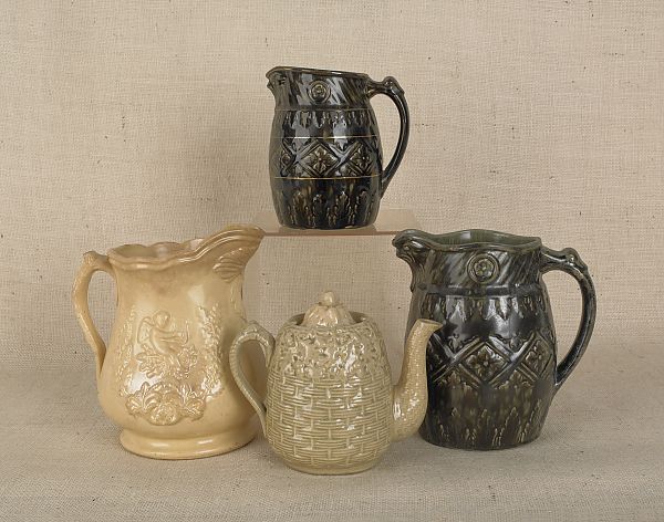 Three pottery pitchers two with 175e22