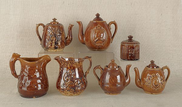 Seven Rockingham glaze pottery