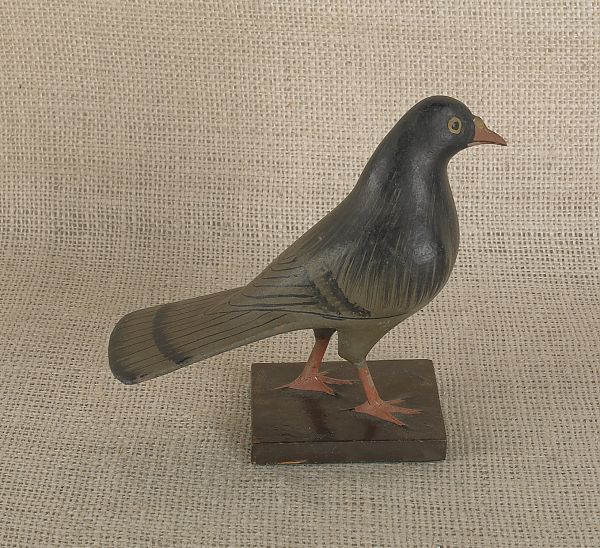 Carved and painted figure of a pigeon