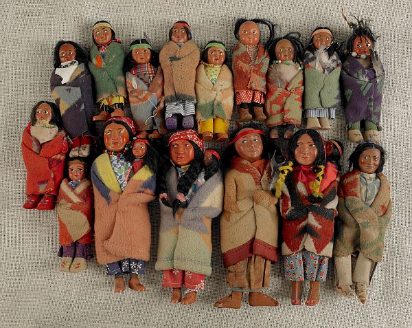 Sixteen Native American Skookum dolls