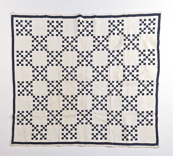 Pieced nine patch variant quilt